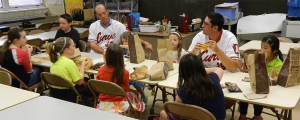 Players for the Minor League Baseball Team, The Curve of Altoona, Pa. partnered with Covelli Enterprises to encourage elementary children to read as part of the Panera Run with Reading Program. The players then visited schools in Spring 2015 to have lunch with those who had read the most books. Featured here are Jacob Stallings, a catcher for the Curve, and Tom Harlan, a pitcher for the team, right.